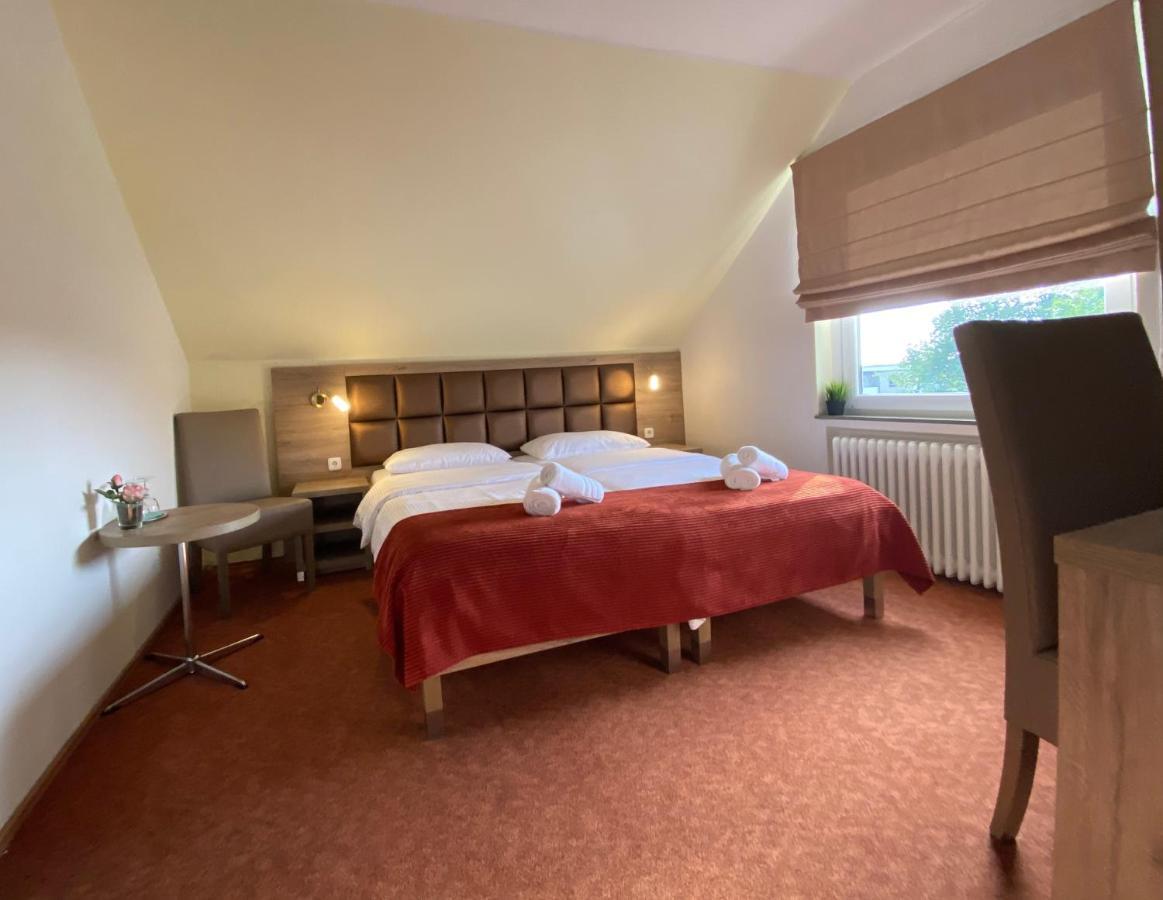 Strand Hotel Nordsee, Hotel Deichlaeufer ทอสเซินส์ ภายนอก รูปภาพ
