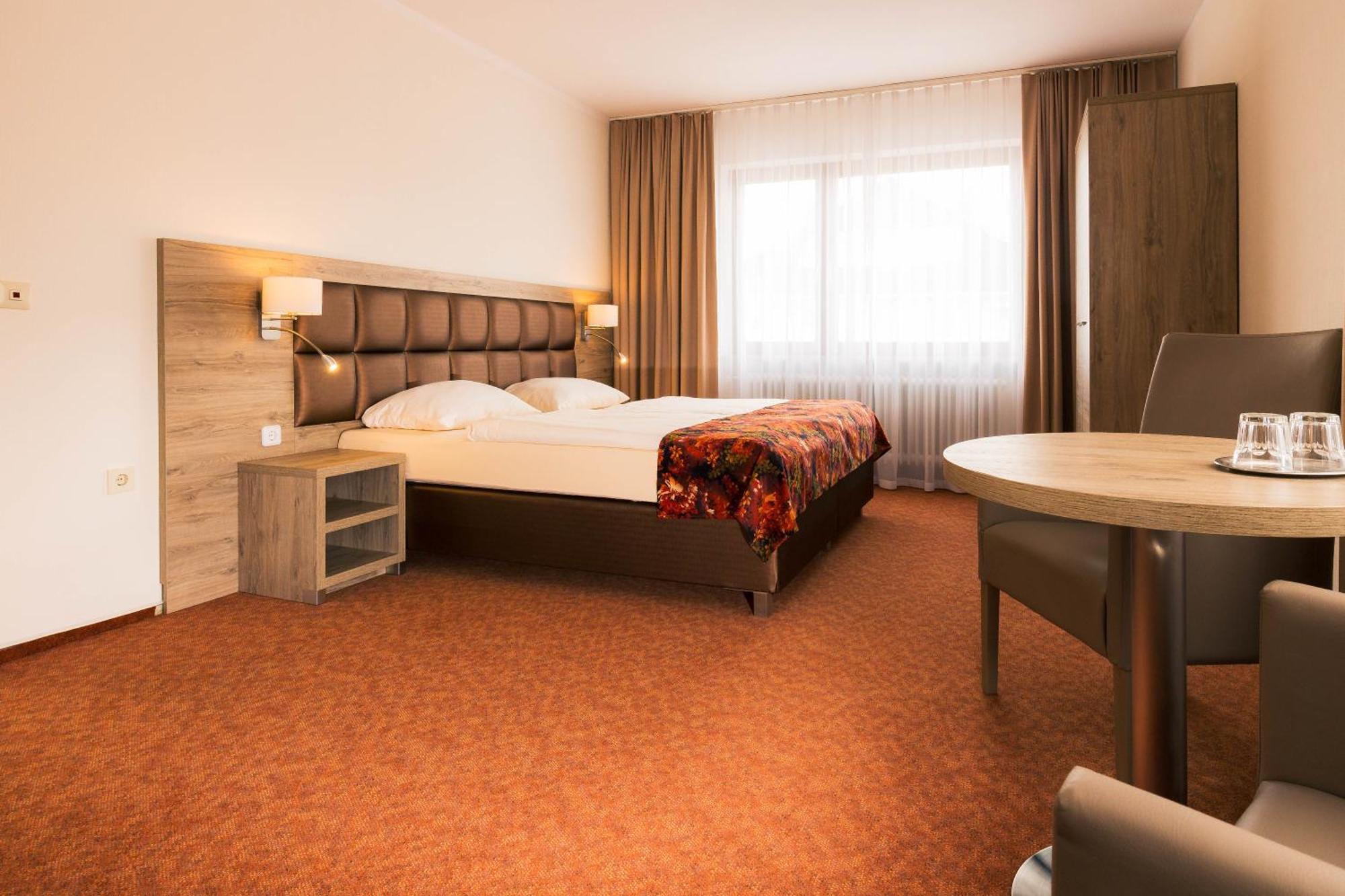 Strand Hotel Nordsee, Hotel Deichlaeufer ทอสเซินส์ ภายนอก รูปภาพ