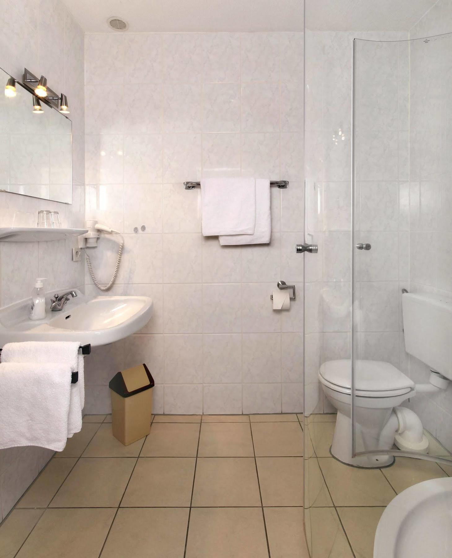 Strand Hotel Nordsee, Hotel Deichlaeufer ทอสเซินส์ ภายนอก รูปภาพ
